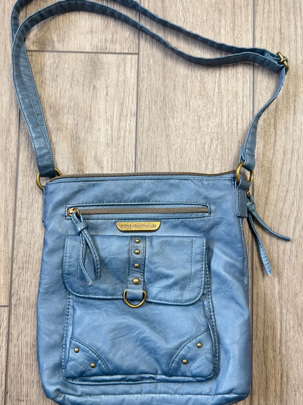 Stone Mountain Accessories Blue Leather Crossbody with Front Pocket and Studs